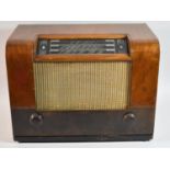 A Vintage Walnut Cased Bush Three Band Radio, 44cm wide