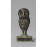 A Small Bronze Seal in the Form of an Owl Standing on Book, 4.25cm high