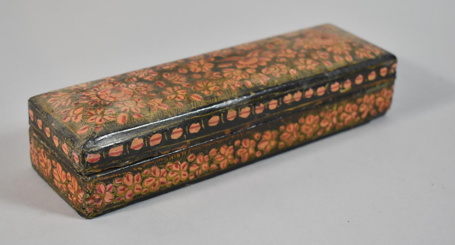 A North Indian Papier Mache Lacquered Pen Box, 20.5cm Wide