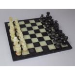 A Onyx Chess Set and Board, 36cm Square