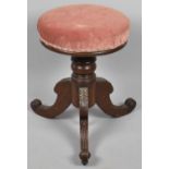 A Late 19th Century Swivel Topped Adjustable Piano Stool on Scrolled Tripod Supports, 35cm Diameter