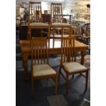 A Modern Rectangular Dining Table and Four Chairs, 150x90cm