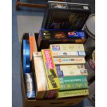 A Box Containing Various Jigsaw Puzzles