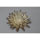 A Large White Metal Filigree Brooch in the Form of a Flower Head, 6.5cm Diameter