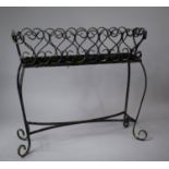 A Wrought Iron Plant Stand, 68cm wide