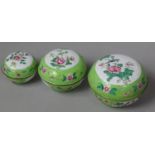 A Graduated Set of Three Chinese Enamelled Pots of Globular Form on Green Ground Decorated with