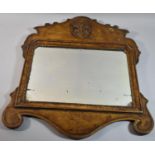 A Walnut Fretwork Shaped Wall Mirror with Moulded Decoration and Inscribed to Reverse Lon JM 1731,