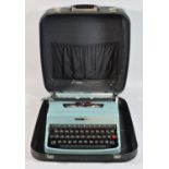 A Vintage Olivetti Lettera 32 Manual Portable Typewriter in Carrying Case