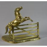 A Mid 20th Century Heavy Brass Ornament in the Form of a Horse Jumping Five Bar Gate, 29cm wide