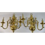 A Pair of Dutch Style Brass Two Branch Wall Hanging Light Fittings