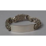 A Heavy Unmarked Silver Curb Bracelet with Bark Finish, 20cm Long, 66g