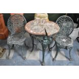 A Green Painted Cast Metal Table and Pair of Chairs, In Need of Renovation