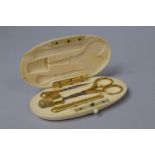 A Late 19th Century Ivory Cased French Necessaire with Silver Gilt Scissors, Thimble, Needle Case