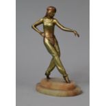 An Art Deco Patinated Bronzed Effect Bronze Effect Metal Figure of a Dancer on Oval Stepped Onyx
