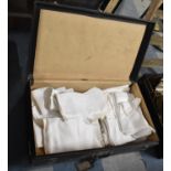 A Brookes Case Containing Various Table Linens