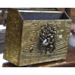 A Mid 20th Century Brass Two Division Magazine Rack, Relief Interior Scene, 37cm wide