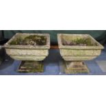 A Pair of Reconstituted Stone Patio Planters, 52cm and 43cm high (to Match 549)
