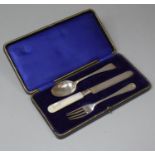 A Cased Silver Christening Set, the Knife with Mother of Pearl Handle, Case af