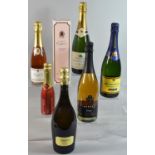 A Collection of Four Bottles of Champagne, One Bottle of Prosecco and One Bottle Sparkling Rose