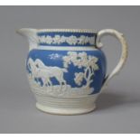 A 19th Century Tavern Jug, the Body Decorated in Relief Fox Hunting Scenes, 14cm high