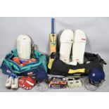 Two Cricket Bags Containing Cricket Equipment to Include Helmets, Pads, Bat etc