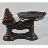 A Set of Vintage Cast Iron Kitchen Scales with Weights