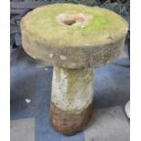 A Sandstone Staddle Stone Base and a Sandstone Grindstone, 52cm diameter