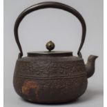 A Chinese Metal Lidded Teapot Having Three Character Mark in Relief to Body and Bronze Lid with