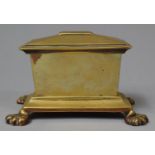 A Mid 19th Century Brass Sarcophagus Shaped Box with Four Claw Feet, 14cm long