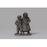 A Small White Metal Study of Mother with Young Boy Holding Catapult Behind Back, 5cm high