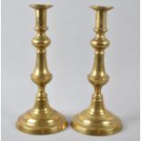 A Pair of Large Late Victorian Brass Candlesticks with Pushers, 30cm high