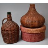 A Wicker Covered Glass Bottle, Wicker Lamp Shade and Cylindrical Box