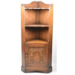 A Mid 20th Century Free Standing Corner Shelved Cupboard with Carved Door to Base and Gallery Top,