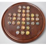 A Mahogany Solitaire Game with Set of Vintage Veined Marbles, 23cm Diameter