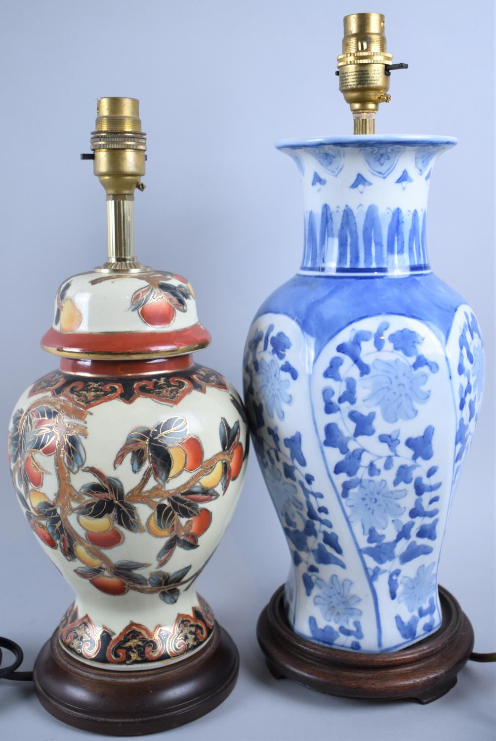 Two Oriental Ceramic Table Lamps on Turned Wooden Bases, Tallest 40cm high