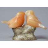 A Carved Stone Study of Two Love Birds on Branch, 8cm high