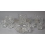 A Collection of Various Cut Glass Bowls, Lidded Pots, Vases, Candle Stick Etc