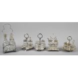 A Collection of Five Edwardian Silver Plated Cruet Sets