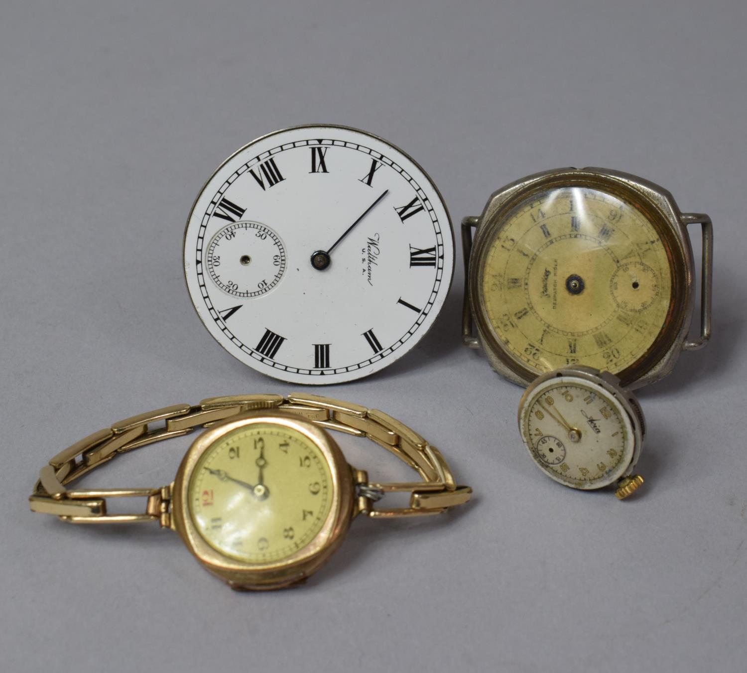 A Waltham Pocket Watch Movement and Three Wrist Watch Movemensts