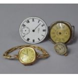 A Waltham Pocket Watch Movement and Three Wrist Watch Movemensts