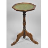 A Reproduction Mahogany Octagonal Topped Wine Table with Tooled Leather Inset, 30cm Diameter