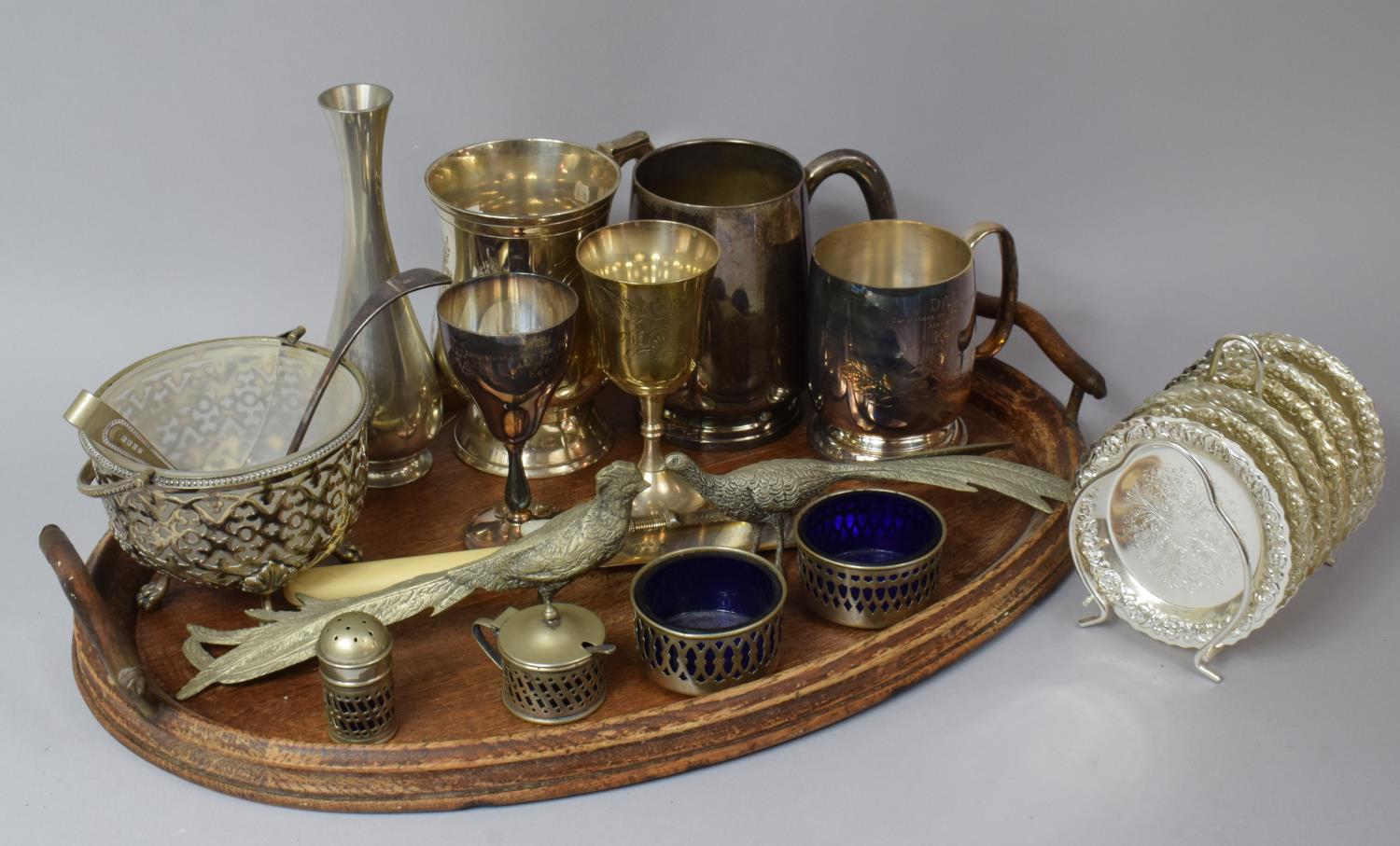 An Oak Drinks Tray together with a Collection of Various Silver Plated Items top comprise