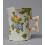 A 19th Century French Faience Side Pouring Jug, Some Nibbles to Rim, 8cm high