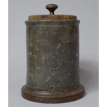 A Cylindrical Lead Tobacco Box with Weighted Press, Inscribed H Fairfax, 12cm diameter and 14.5cm