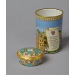 A Halcyon Days Enamel Cylindrical Pen Holder and an Oval Box