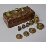 A Wooden Block Housing Metric Scale Weights etc