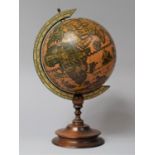 A Reproduction 16th Century Style Table Globe, 35cm high
