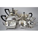 An Edwardian Four Piece Silver Plated Tea service and Three Piece Example