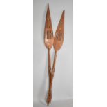 A Pair of Tribal Souvenir Spear Shaped Paddles, Each 106cm long