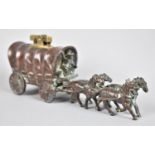 A Novelty Bronze Effect Lighter In the Form of an American Covered Wagon Pulled by Four Horses, 18cm